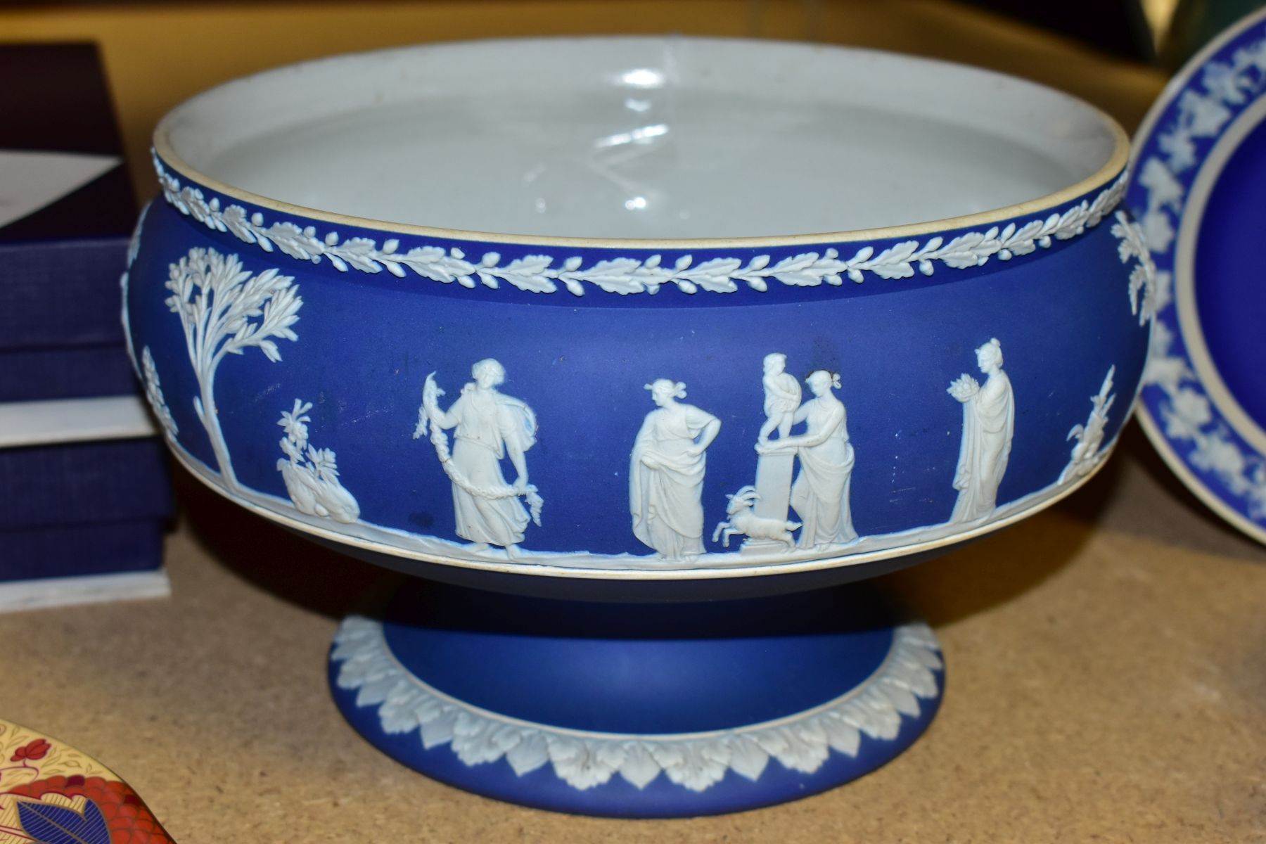 THREE PIECES OF WEDGWOOD BLUE JASPERWARE, comprising a pedestal fruit bowl, the applied decoration - Image 6 of 9