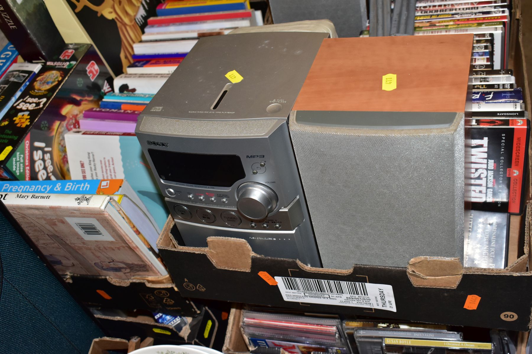 FOUR BOXES OF DVD'S, CD'S, BOOKS ETC, including a Sony HP3 CD player and speakers (not tested), over - Image 3 of 6