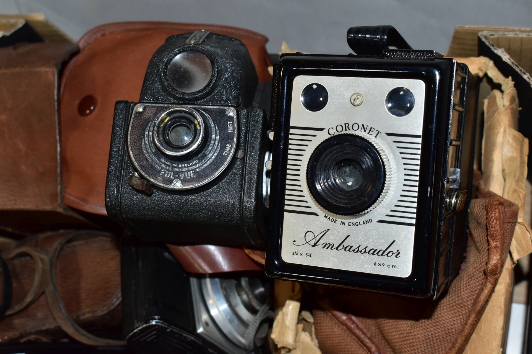 A BOX OF CAMERAS AND BINOCULARS, to include a Rolleicord Compur camera in leather case, an Ensign - Image 4 of 5