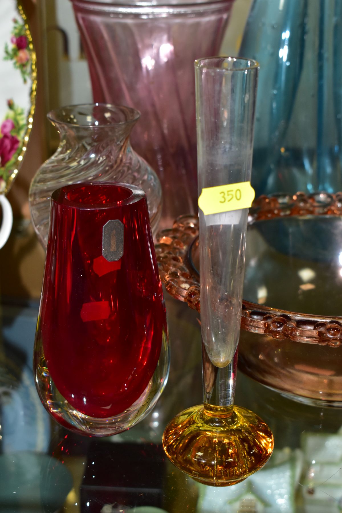 TEN PIECES OF COLOURED GLASSWARE including a blue glass vase of triform shape, with bubble - Image 3 of 10