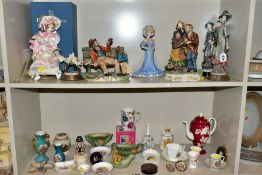 A GROUP OF CERAMIC FIGURES AND ORNAMENTS, including Capo Di Monte tramp on a bench, elderly