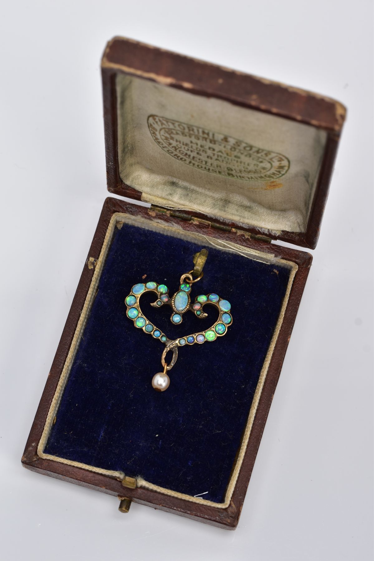 AN OPAL PENDANT, of an openwork heart form, set with oval and circular cut cabochon opals, - Image 5 of 5