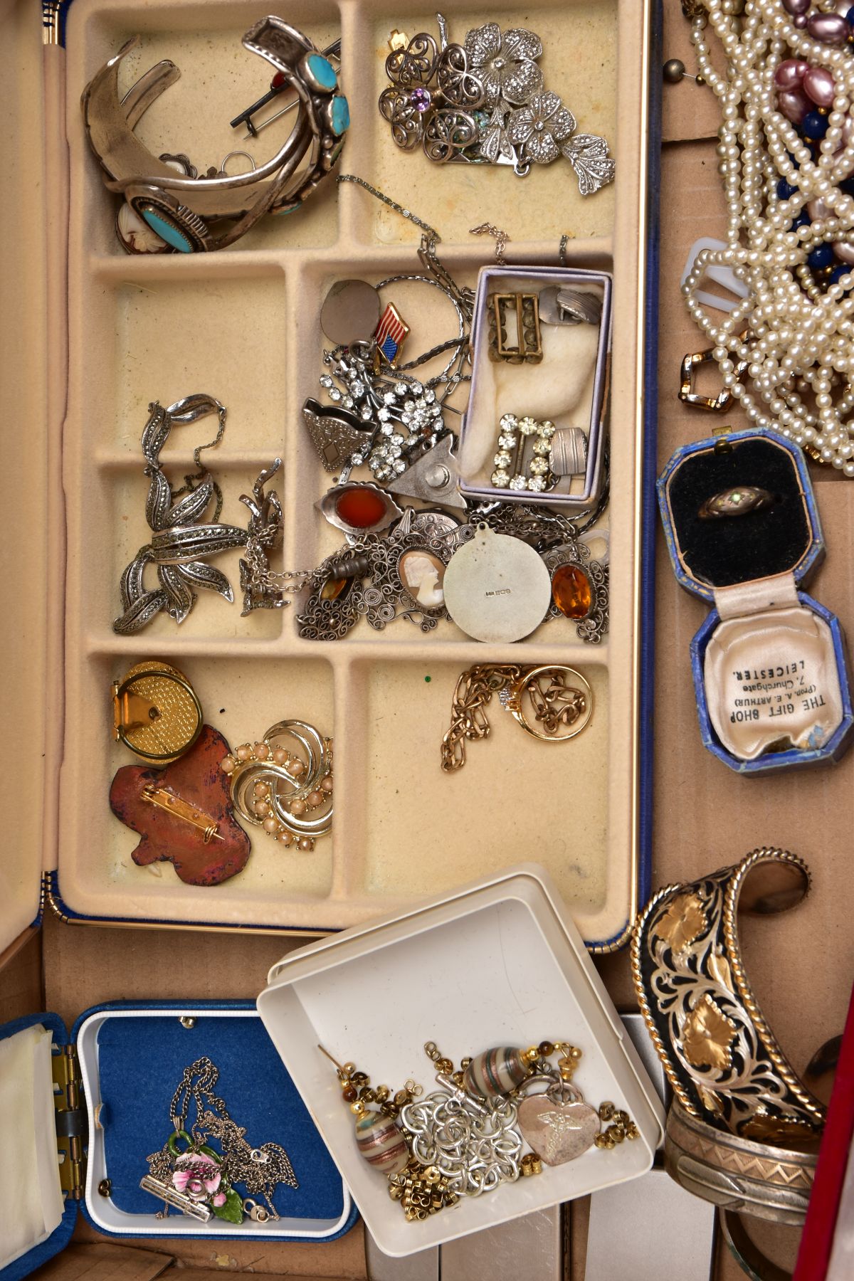 A BOX OF ASSORTED ITEMS, to include a blue velvet jewellery box with contents such as a silver St. - Image 4 of 7