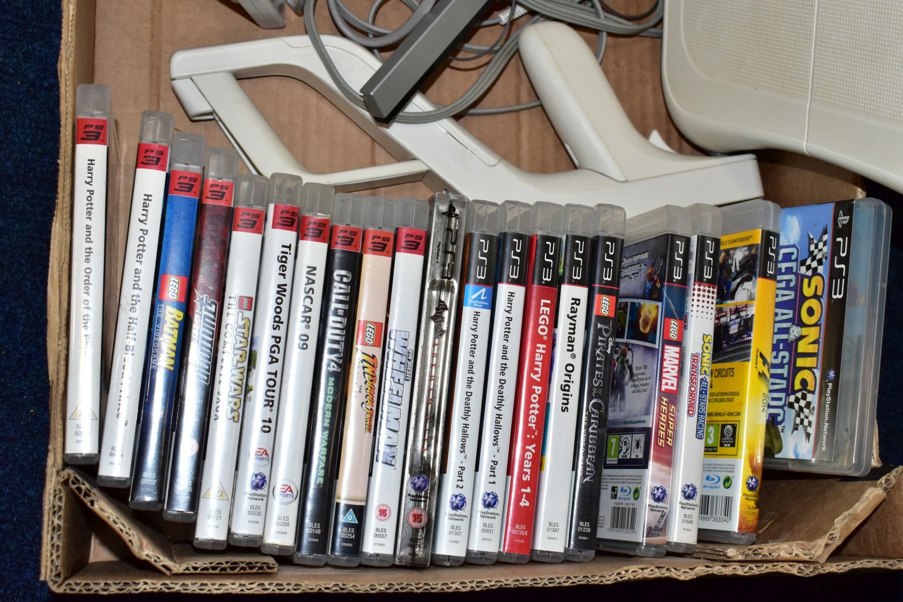 A BOX OF GAMING ITEMS, to include Wii console and Wii fit board and game, various other games ( - Image 2 of 4