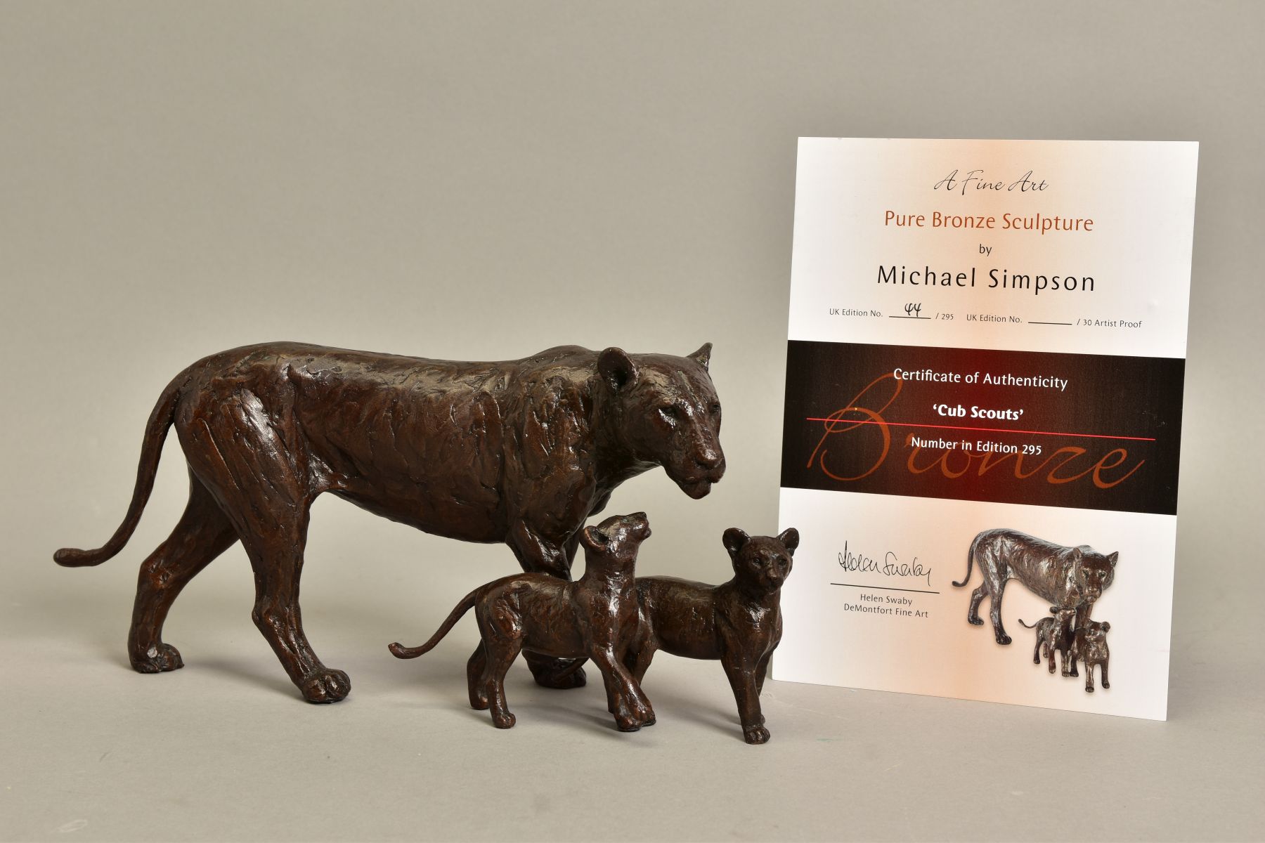 MICHAEL SIMPSON (BRITISH CONTEMPORARY) 'CUB SCOUTS', a limited edition bronze sculpture of a lioness