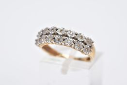 A 9CT GOLD DIAMOND RING, designed with two rows of illusion set, round brilliant cut diamonds,