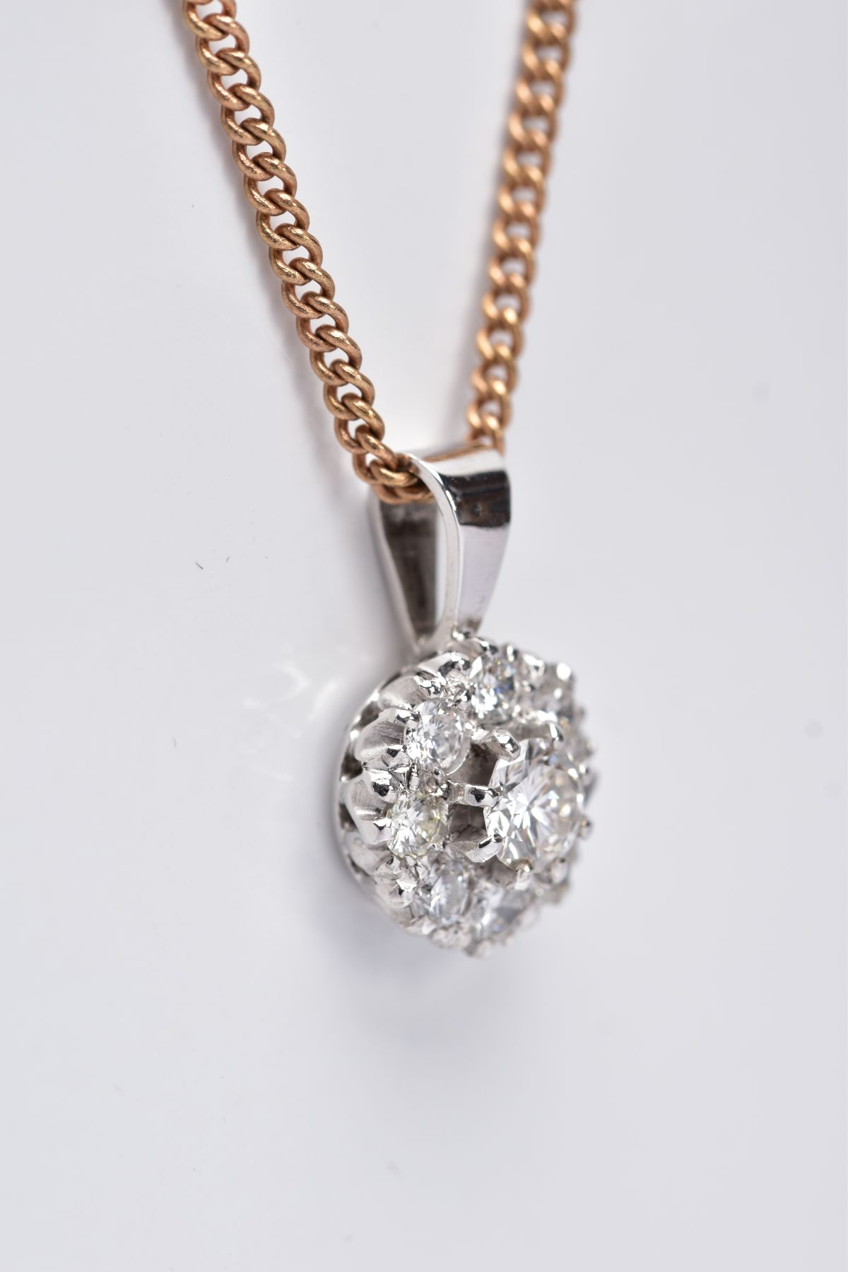 A LATE 20TH CENTURY ROUND DIAMOND CLUSTER PENDANT AND CHAIN, centring on a modern round brilliant - Image 2 of 4