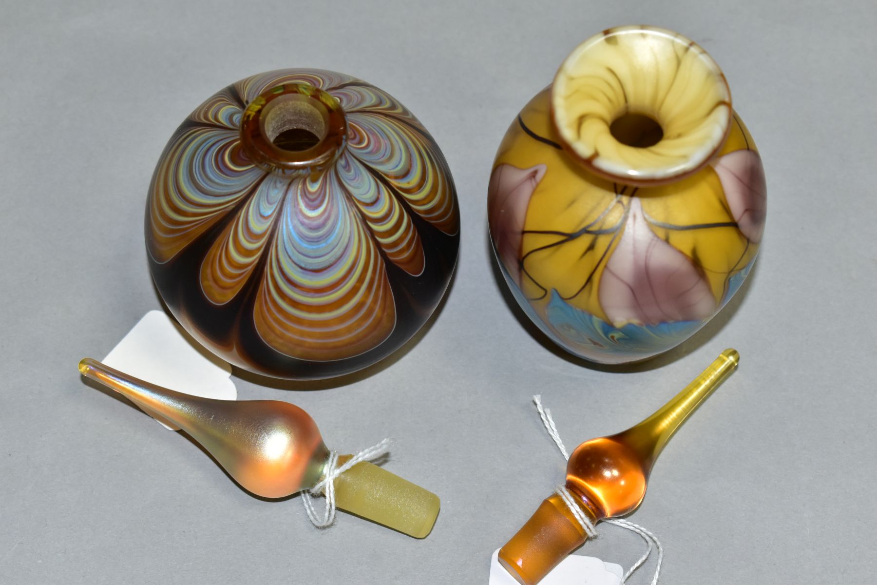 TWO IRIDESCENT PERFUME BOTTLES AND STOPPERS, one of baluster form, height 16cm, the other of bulbous - Image 4 of 5