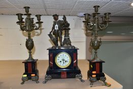 A LATE 19TH CENTURY BLACK SLATE, MARBLE AND BRONZED CLOCK GARNITURE, the clock with figural surmount