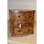 A VICTORIAN BURR WALNUT VENEERED MINIATURE BOW FRONT CHEST OF THREE DRAWERS, turned wooden