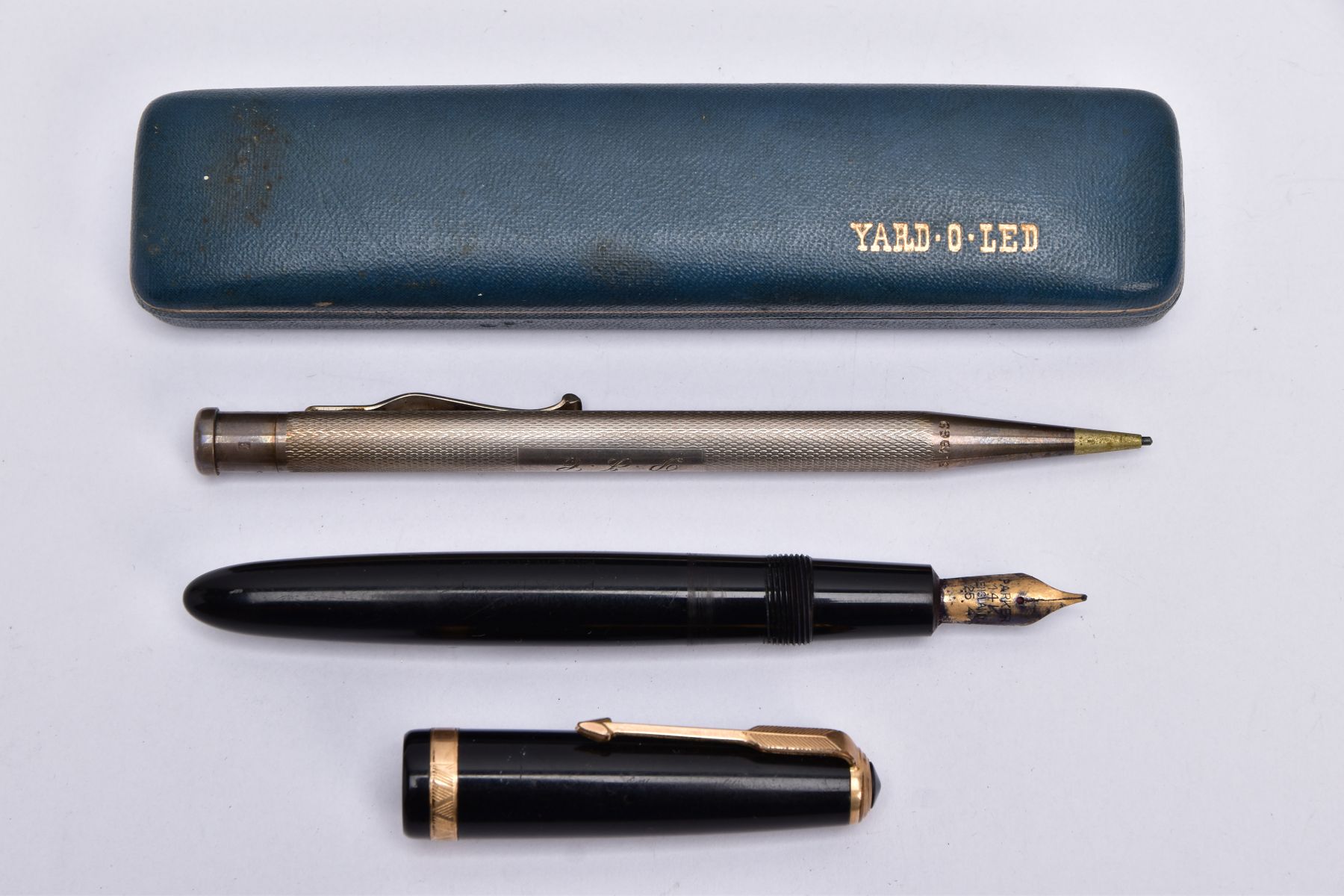 A SILVER PROPELLING PENCIL AND A PARKER FOUNTAIN PEN, the 'Yard O Led' silver pencil of an engine - Image 2 of 3