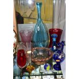 TEN PIECES OF COLOURED GLASSWARE including a blue glass vase of triform shape, with bubble