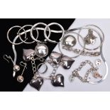 A BAG OF ASSORTED SILVER AND WHITE METAL JEWELLERY, to include a silver charm bracelet suspending