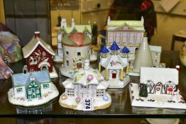 NINE COALPORT FINE BONE CHINA COTTAGES/BUILDINGS, comprising 'The Parasol House' (several flowers