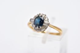 A LATE 20TH CENTURY 18CT GOLD SAPPHIRE AND DIAMOND OVAL CLUSTER RING, centring on a mixed cut