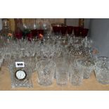 A QUANTITY OF GLASSWARE, including a Waterford Crystal quartz mantel clock, height 11cm, coloured