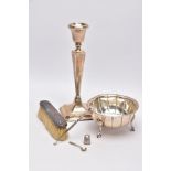 A SELECTION OF SILVER AND WHITE METAL ITEMS, to include a silver, tapered column candlestick on a