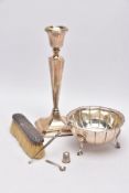 A SELECTION OF SILVER AND WHITE METAL ITEMS, to include a silver, tapered column candlestick on a