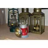 TWO PARAFFIN/OIL STORM LANTERNS, both use 1 inch wicks, approximate height 39cm, together with a