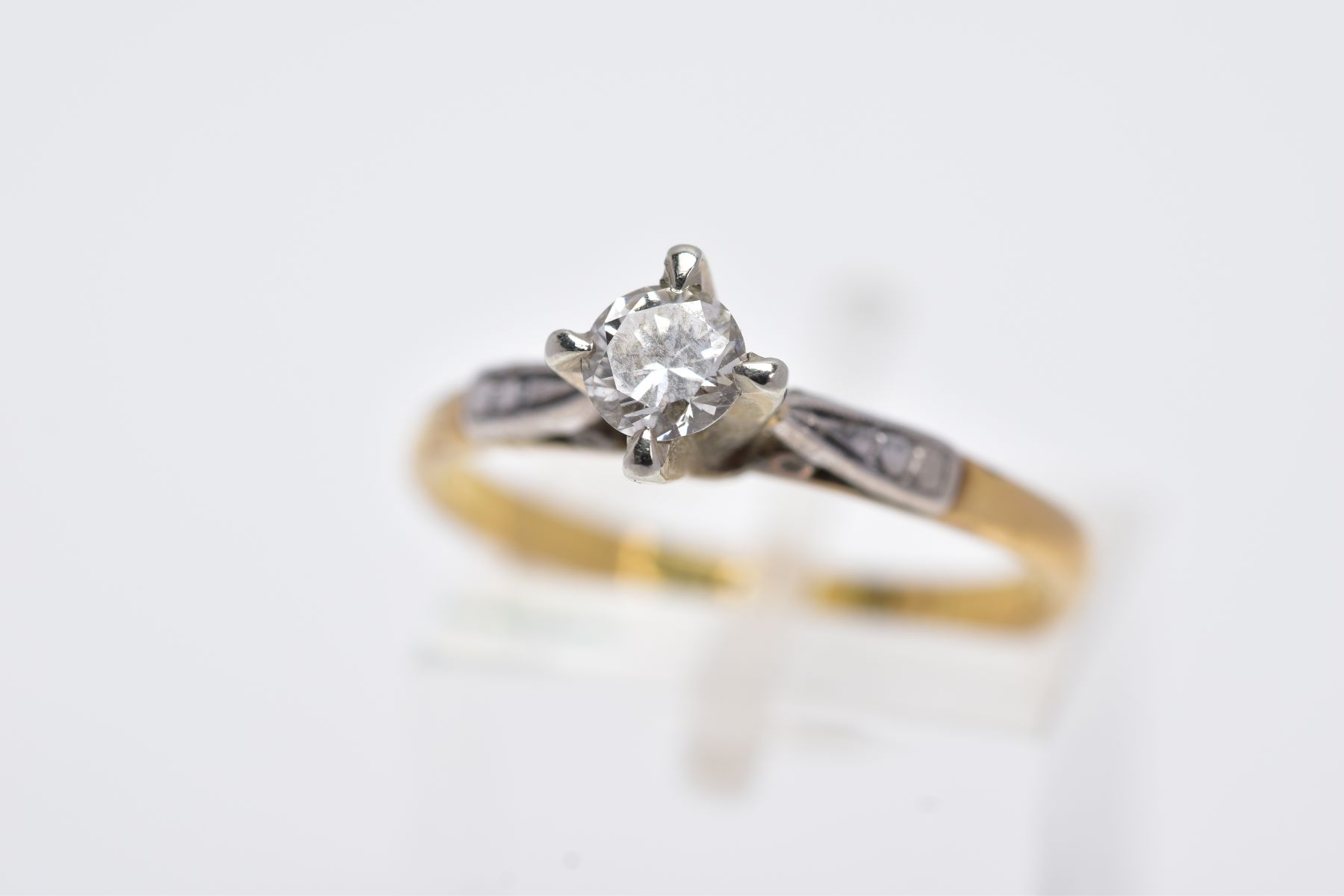 A DIAMOND SINGLE STONE RING, estimated modern round brilliant cut diamond weight 0.30ct, colour