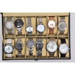 A WATCH DISPLAY CASE WITH WATCHES, a black and glass panelled watch display case with twelve watches