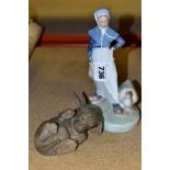 TWO ROYAL COPENHAGEN FIGURES, comprising Goose Girl No 067, height 18.5cm and Dachshund Puppy No