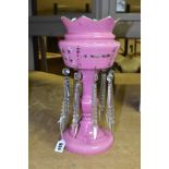 A VICTORIAN PINK GLASS LUSTRE WITH CLEAR CUT GLASS DROPPERS, gilt wavy rim above white enamel and
