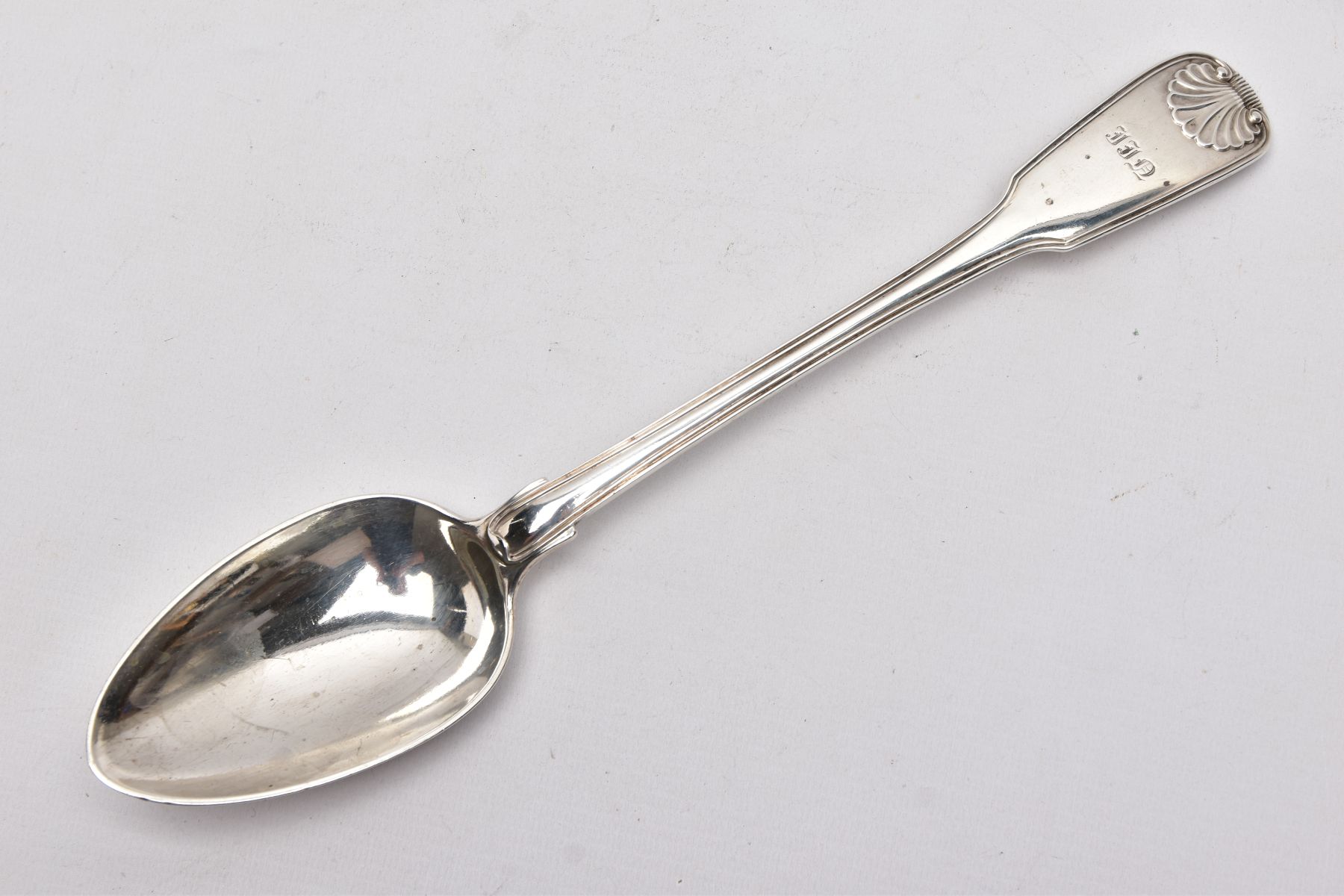 AN EARLY VICTORIAN LARGE SILVER SERVING SPOON, kings pattern design with a reeded rim, engraved