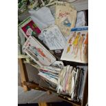 TWO BOXES OF TABLE LINEN, DRESS PATTERNS AND A TAPESTRY FRAME, linen includes various size table