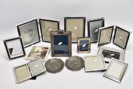A BOX OF SILVER, SILVER PLATE AND WHITE METAL PHOTOFRAMES, to include a small silver, rectangular