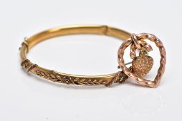 A LATE VICTORIAN BANGLE AND BROOCH, the AF hinged bangle with applied floral and bead design,