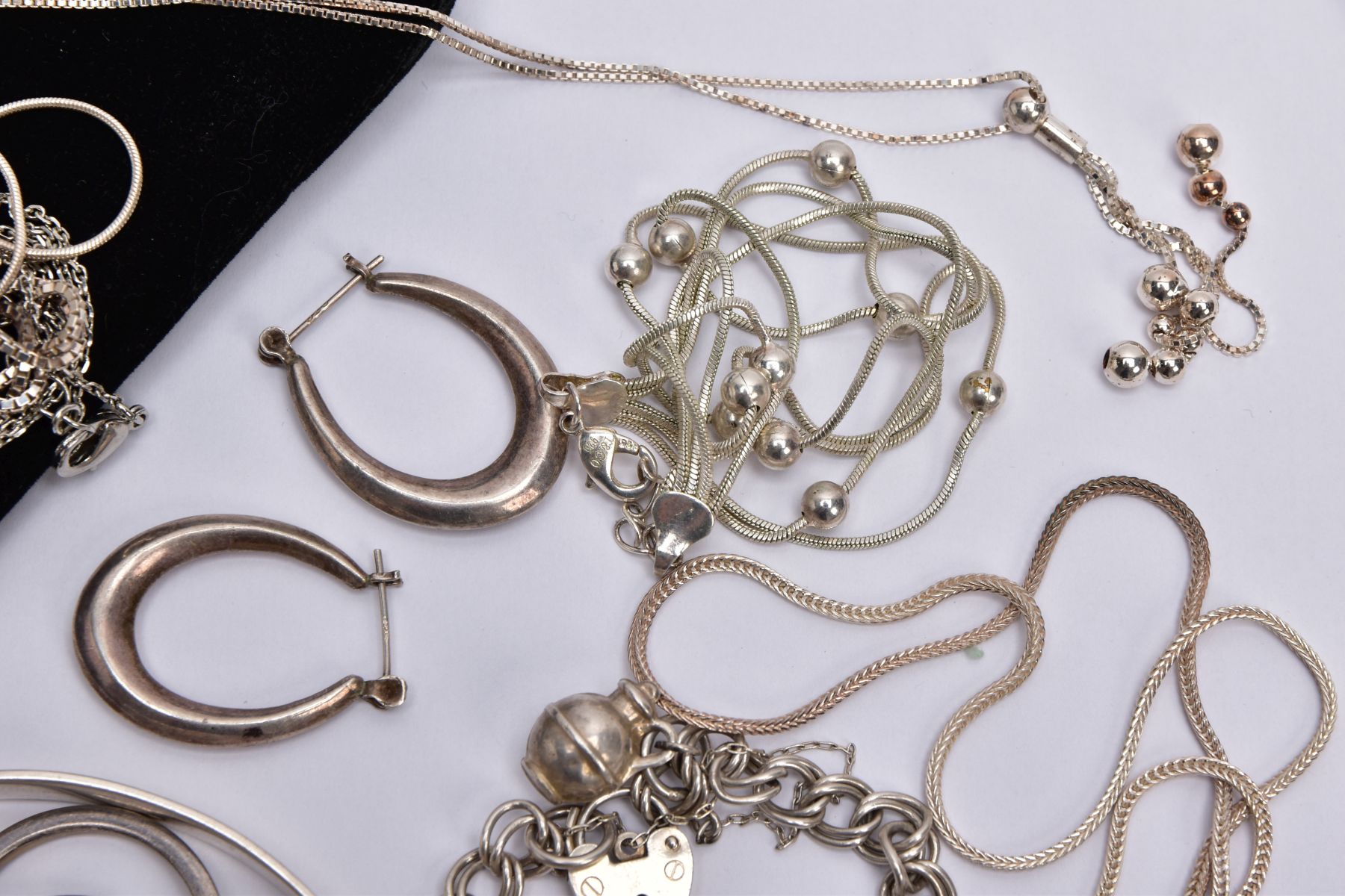 A BAG OF ASSORTED WHITE METAL JEWELLERY, to include a white metal bangle stamped '925', a white - Image 5 of 5