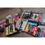 SEVEN BOXES OF ASSORTED BOOKS, including novels, cookery books, DIY books, motoring interest etc,
