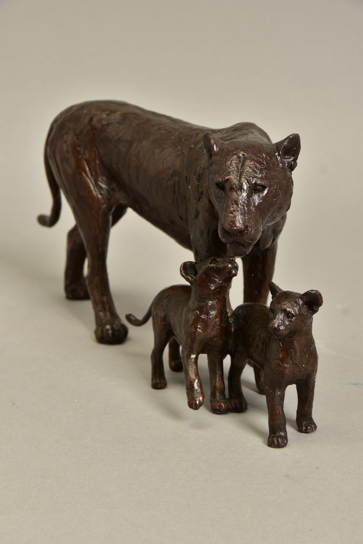 MICHAEL SIMPSON (BRITISH CONTEMPORARY) 'CUB SCOUTS', a limited edition bronze sculpture of a lioness - Image 2 of 6