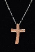 A MODERN 18CT ROSE GOLD DIAMOND SET CROSS AND WHITE GOLD CHAIN, a small textures rose gold cross