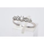 AN EARLY 20TH CENTURY FIVE STONE DIAMOND RING, designed with five claw set, graduated old cut