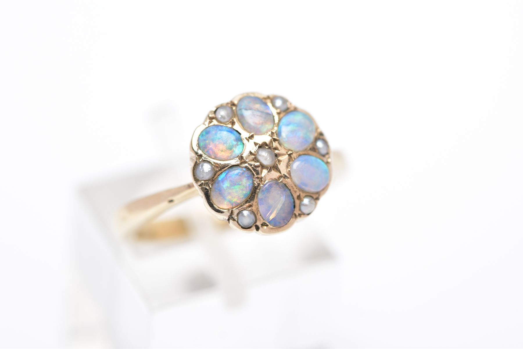 A MODERN 9CT GOLD OPAL AND SPLIT PEARL CLUSTER RING, designed with oval cabochon opals and split - Image 4 of 4