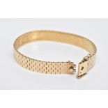 A 9CT GOLD FLAT LINK BRACELET, engraved detailing, approximate width 9.9mm, double locking clasp