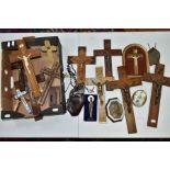 A BOX OF VARIOUS CRUCIFIXES, some metal, mostly resin, mostly wall hangings, tallest height 36cm,