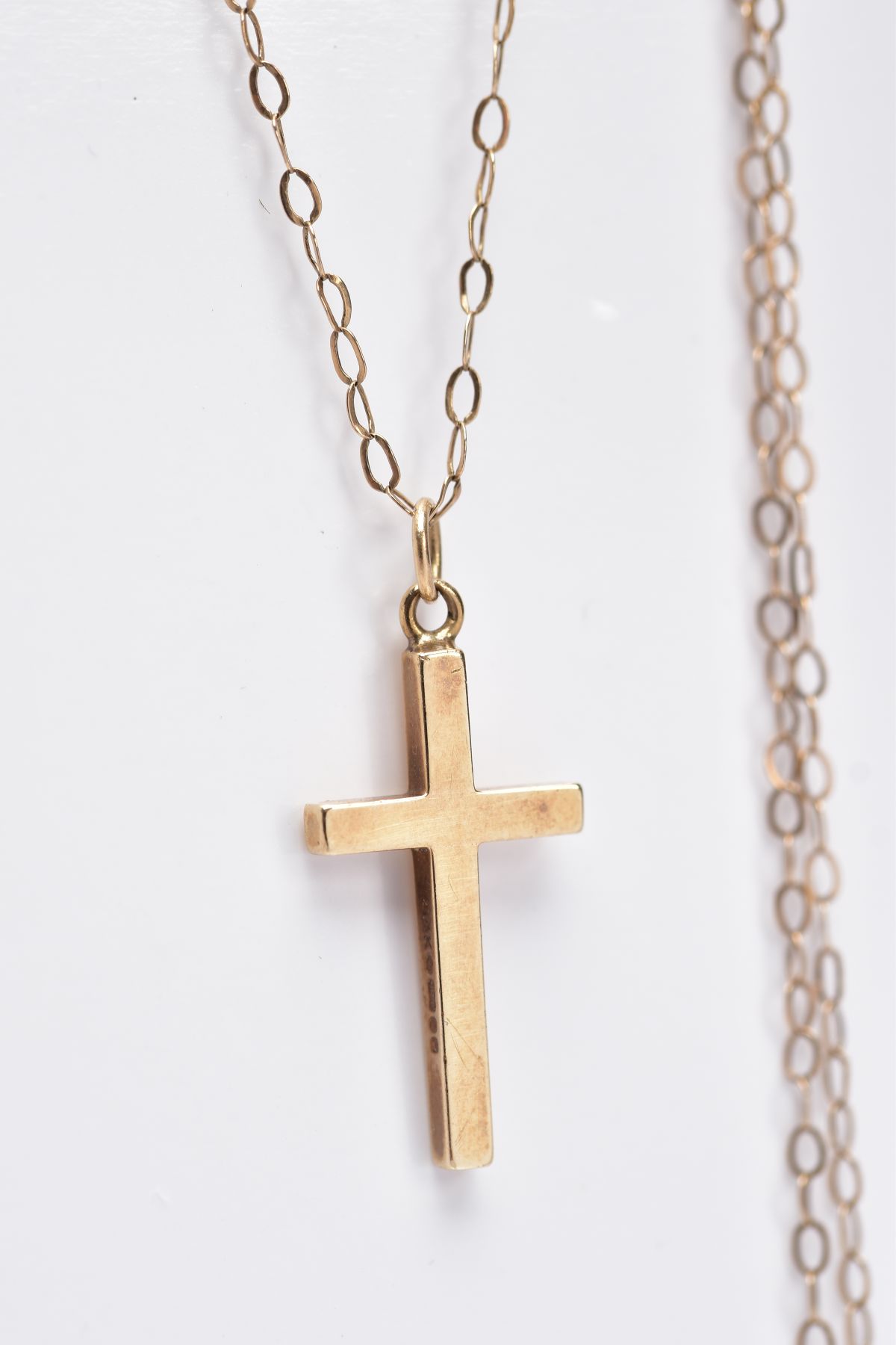 A 9CT GOLD CROSS PENDANT NECKLACE, the pendant of a plain polished design, hallmarked 9ct gold - Image 2 of 3