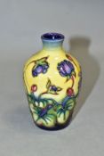 A SMALL MOORCROFT POTTERY BUD VASE 'Hepatica' pattern, by Emma Bossons, impressed backstamp and gilt