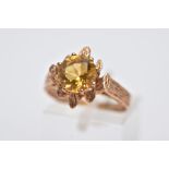 A 9CT GOLD SINGLE STONE CITRINE RING, a round mixed cut citrine measuring approximately 8.0mm in