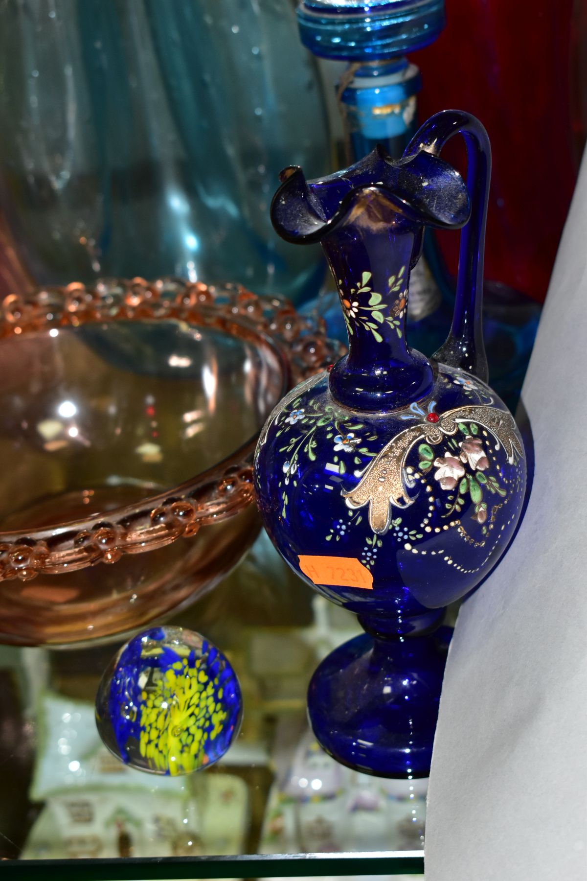 TEN PIECES OF COLOURED GLASSWARE including a blue glass vase of triform shape, with bubble - Image 2 of 10