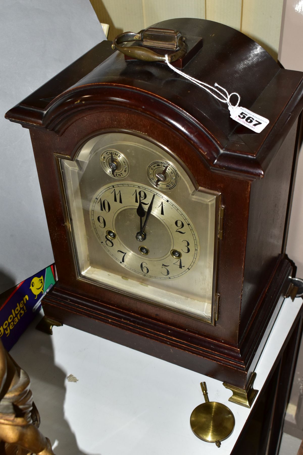 AN EARLY 2OTH CENTURY MAHOGANY STAINED GEORGE III STYLE BRACKET CLOCK, silvered dial with Arabic