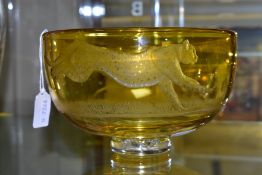 AN ENGLISH ANTIQUE GLASS FOOTED AMBER BOWL, with etched detail of Gazelle being chased by Cheetah,