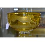 AN ENGLISH ANTIQUE GLASS FOOTED AMBER BOWL, with etched detail of Gazelle being chased by Cheetah,