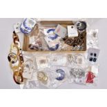 A TRAY OF COSTUME JEWELLERY, some pieces with tags and packaging, to include a large resin hoop