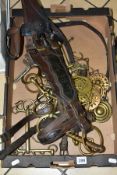 A BOX OF HEAVY HORSE TACK AND HORSE BRASSES, including a halter with brass bit attached and