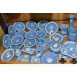 WEDGWOOD BLUE JASPERWARE TRINKETS AND VASES, etc, to include a set of twelve dishes from Zodiac