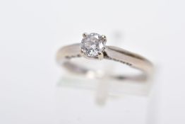 AN 18CT WHITE GOLD DIAMOND RING, designed with a central claw set, round brilliant cut diamond,